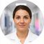 Tixy Fotiniuc, healthcare worker in a hospital setting in Rome